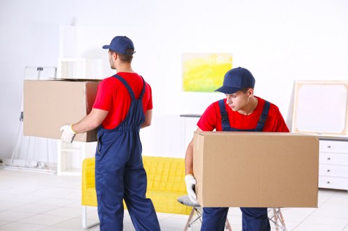House movers loading furniture on a Croydon residential street