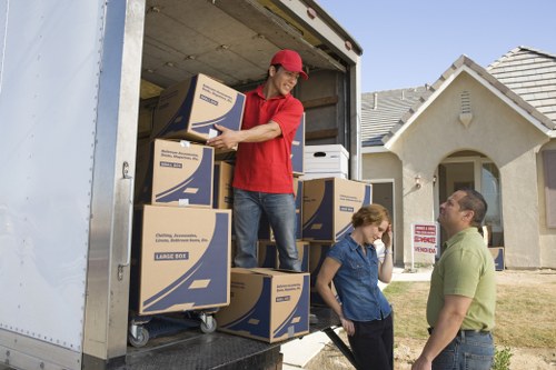 Packed household boxes and furniture ready for moving day