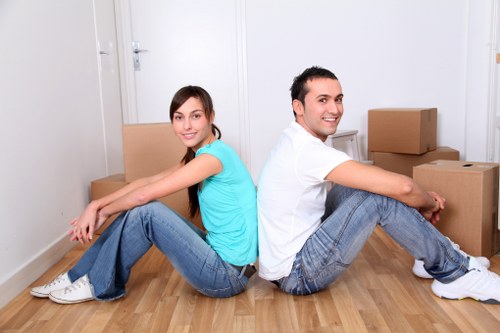 Local moving team loading furniture into a van in Croydon