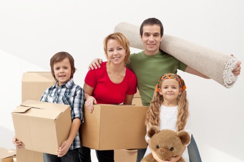 Moving team loading furniture for a Croydon flat or house move