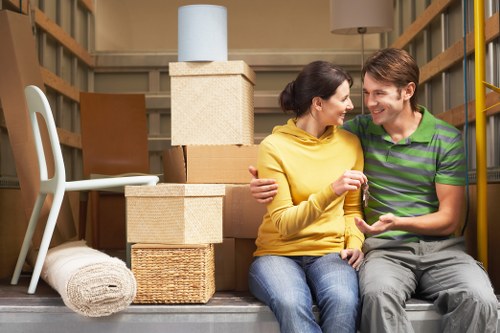 Loading furniture into a van for a Croydon house move